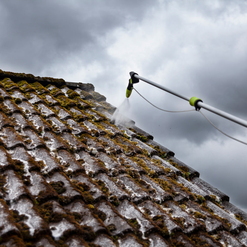 
                      
                        AVA telescopic lance used with a turbo nozzle to clean a tiled roof with a cloudy sky background
                      
                    